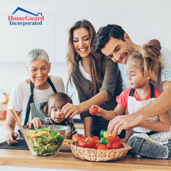 HomeGuard - a family preparing food in the kitchen - Home Inspectors Near Me - Livermore, California HomeGuard - a family preparing food in the kitchen - Home Inspectors Near Me - Livermore, California