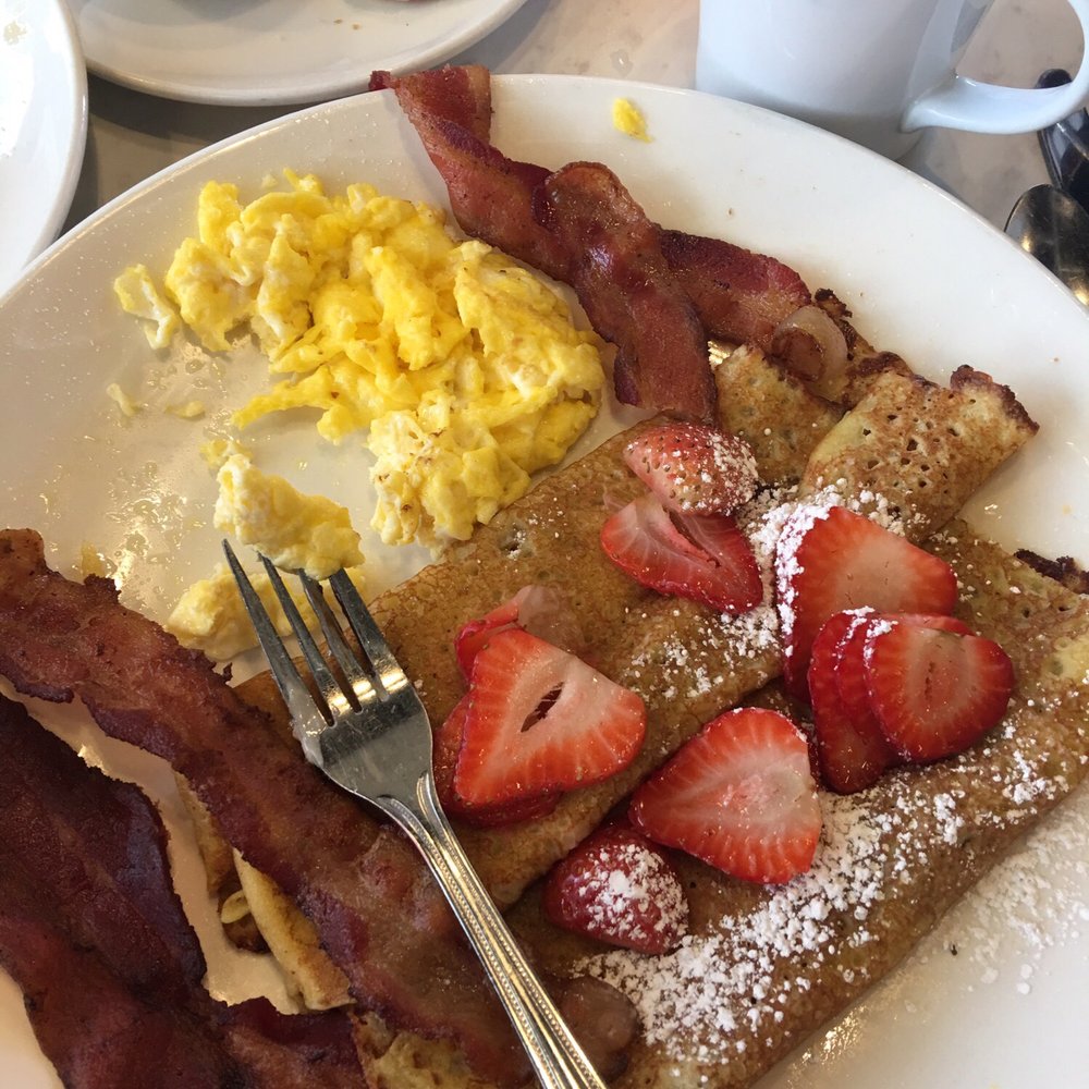 Eggsellent Cafe - Crepe combo, comes with two crepes, two eggs, two sausage and two bacon. I asked for all bacon. It was yummy. - Breakfast & Brunch Near Me - Frisco, Texas