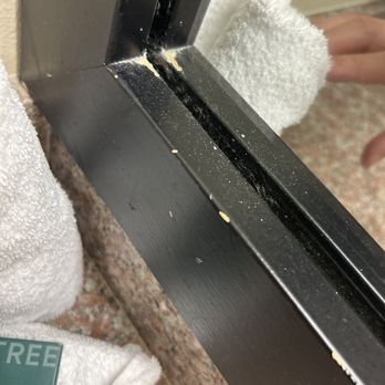 DoubleTree by Hilton - Damaged / dirty bathroom mirror frame. - Hotels Near Me - Orlando, Florida DoubleTree by Hilton - Damaged / dirty bathroom mirror frame. - Hotels Near Me - Orlando, Florida