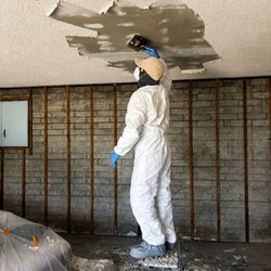 AJ Drywall & Repair - Scraping away outdated popcorn ceilings for a cleaner, modern look.