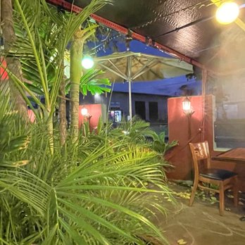 Brigit & Bernard's Garden Cafe - The large plant near our table outside - American Near Me - Kahului, Hawaii Brigit & Bernard's Garden Cafe - The large plant near our table outside - American Near Me - Kahului, Hawaii