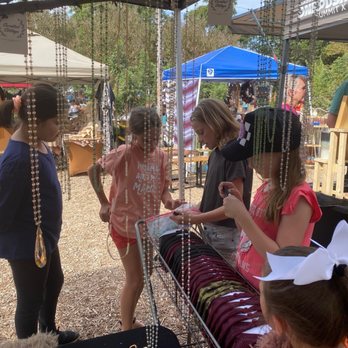 12 Fox Beer - Vendor stands with little girls having fun! - Brewpubs Near Me - Dripping Springs, Texas