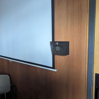 The Bureau Escape Rooms - Push the button on the call box to get in - Escape Games Near Me - Orlando, Florida