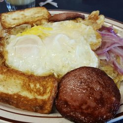 Delicias Del Caribe Restaurant - This is authentic and amazing. Mangu (mashed green plantains with onions) eggs fried cheese fries dominican salami!