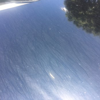 So Cal Express Car Wash - Streaky and glittery finish on the hood with huge spots of dirt still left. - Car Wash Near Me - Ontario, California