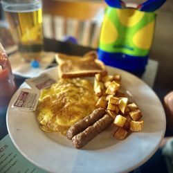 Classic American breakfast with sausage and eggs