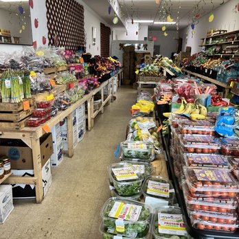 Swinging Bananas - a produce section of a grocery store - Farmers Market Near Me - Oakland Park, Florida Swinging Bananas - a produce section of a grocery store - Farmers Market Near Me - Oakland Park, Florida