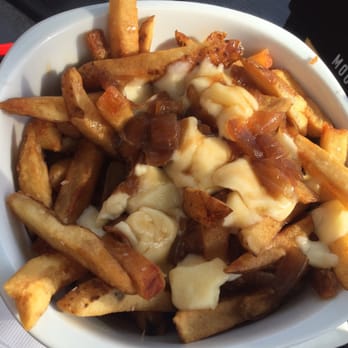 Canoe and Paddle - Poutine - homemade gravy, ample cheese curds, fresh cut fries. - British Near Me - Lakefield, Ontario Canoe and Paddle - Poutine - homemade gravy, ample cheese curds, fresh cut fries. - British Near Me - Lakefield, Ontario