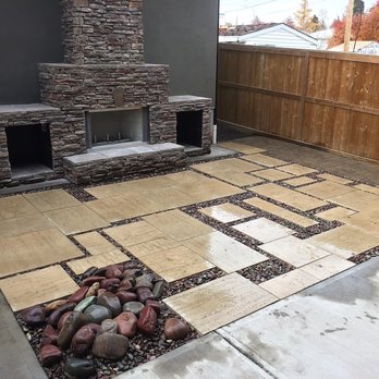Yard Force - a patio with a fire place - Landscaping Near Me Yard Force - a patio with a fire place - Landscaping Near Me