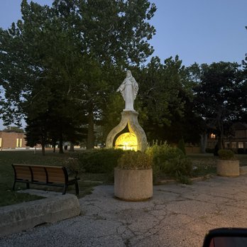 St Scholastica Parish - Jesus over the lit up glob - Churches Near Me - Detroit, Michigan St Scholastica Parish - Jesus over the lit up glob - Churches Near Me - Detroit, Michigan