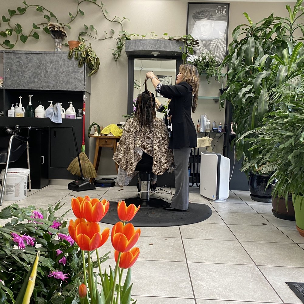 Serena Hair Design - Mia in her beautiful atrium doing what she does best - Hair Salons Near Me - Maple Valley, Washington Serena Hair Design - Mia in her beautiful atrium doing what she does best - Hair Salons Near Me - Maple Valley, Washington
