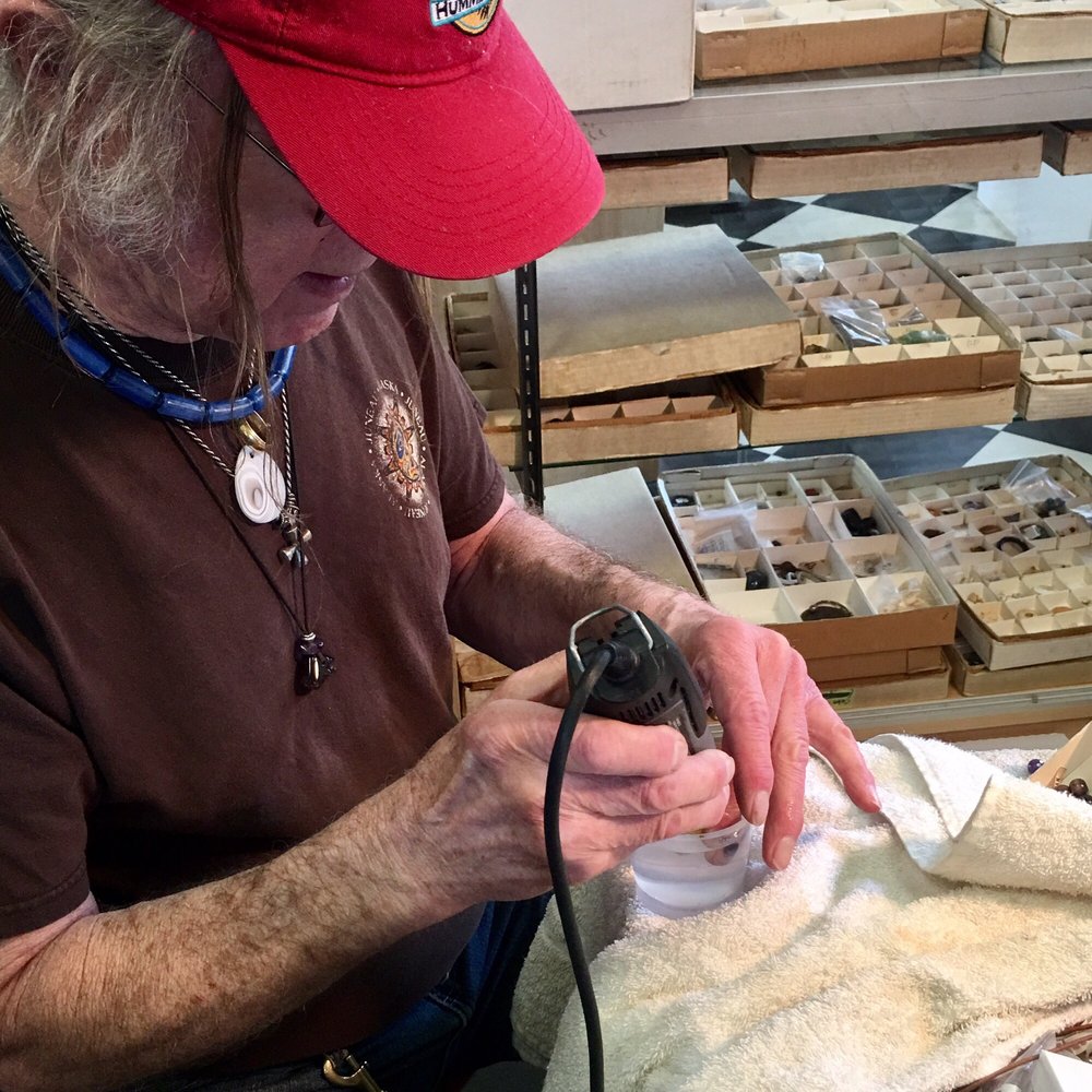 Crystal Power & Light - Jim himself working with me and resizing the hole for my necklace on a piece of amber I chose. - Gemstones & Minerals Near Me - Salem, Oregon Crystal Power & Light - Jim himself working with me and resizing the hole for my necklace on a piece of amber I chose. - Gemstones & Minerals Near Me - Salem, Oregon