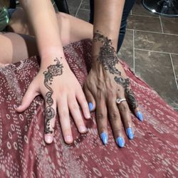 Mahboob Salon & Spa - We had a great, easy experience here with getting henna. The staff was very accommodating and talented.
