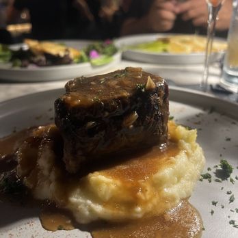 Korner 67 - Tender braised short rib, red wine glaze, truffled mashed potatoes - Cocktail Bars Near Me - Miami Lakes, Florida