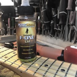 White Glove Guitar Service - Clean & condition the fretboard