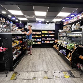 Lakeside Deli - a woman in a grocery store - Sandwiches Near Me - Henrico, Virginia