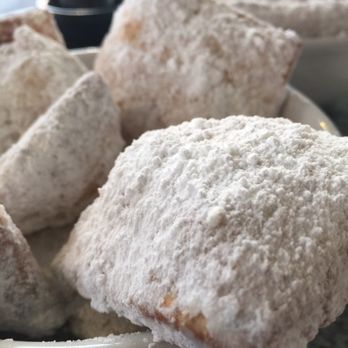 Roux Dat - Beignets (Ben-yays) French doughnuts, served with Rum sauce - Cajun/Creole Near Me - Capitola, California Roux Dat - Beignets (Ben-yays) French doughnuts, served with Rum sauce - Cajun/Creole Near Me - Capitola, California
