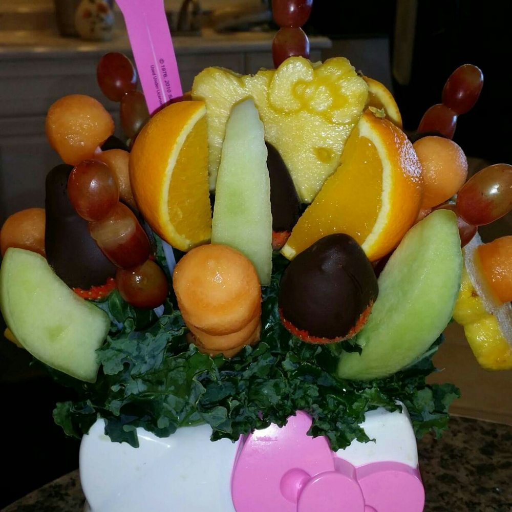 a hello kitty fruit arrangement