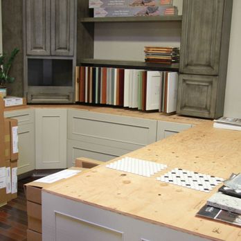 Cal Tile Co - a kitchen with a sink and cabinets - Flooring Near Me - Albany, California Cal Tile Co - a kitchen with a sink and cabinets - Flooring Near Me - Albany, California