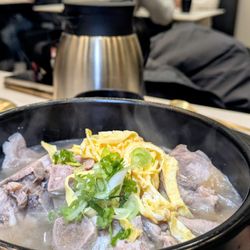 Pork bone soup. They use beef broth for all soups.