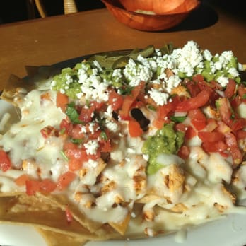 Montecristo Taqueria - Chicken nachos with guacamole & queso fresco! - Mexican Near Me - Berkeley, California