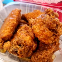 Raise the Roost Chicken & Biscuits - Chicken wings with mango habanero sauce