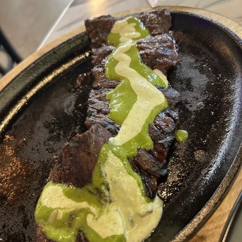 The Burger Temple - a steak with green sauce on it - Juice Bars & Smoothies Near Me - Weehawken, New Jersey The Burger Temple - a steak with green sauce on it - Juice Bars & Smoothies Near Me - Weehawken, New Jersey