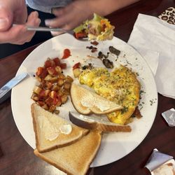 Abigail's Tap Room - Omelette, mushrooms tasted like they were from a can, hard potatoes, no seasoning