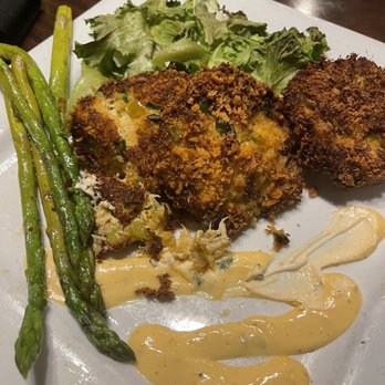 Black Rock Bar & Grill - Crab cake entree with side of asparagus - American Near Me - Hartland, Michigan