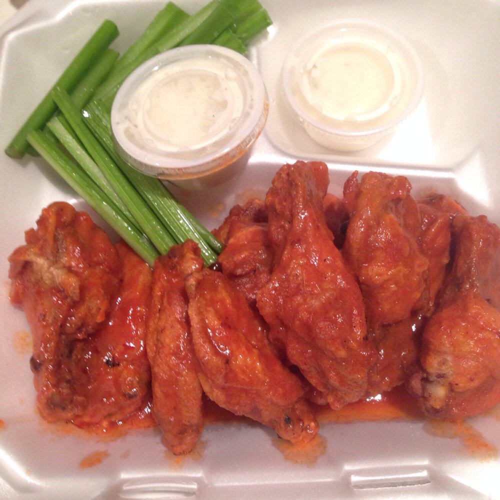 Hot wings are killer. $7.50 for a dozen or $5 for a half. Great sauce with heat not too overpowering. Hot wings are killer. $7.50 for a dozen or $5 for a half. Great sauce with heat not too overpowering.