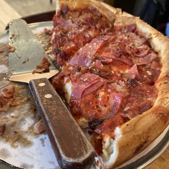 Gino's East - South Loop - Meat & more meat deep dish pizza - Pizza Near Me - Chicago, Illinois