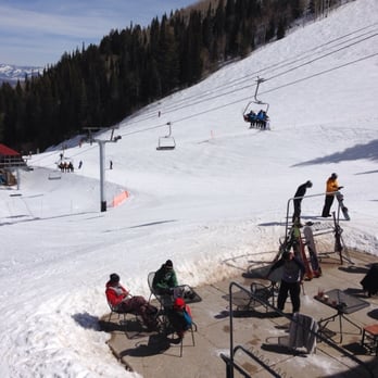 Sun Lodge - skiers and snowboarders at the bottom of a slope - New American Near Me - Park City, Utah Sun Lodge - skiers and snowboarders at the bottom of a slope - New American Near Me - Park City, Utah