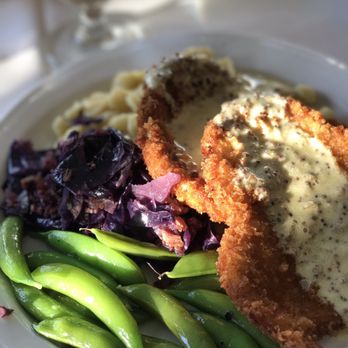 Roselawn Dining Room - Schnitzel with Spätzle and purple cabbage - American Near Me Roselawn Dining Room - Schnitzel with Spätzle and purple cabbage - American Near Me