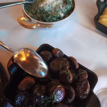 Oscar's Steakhouse - 8/27/2024.  Mushrooms ($14): perfectly seasoned with a slight tang, 5/5 stars! Creamed spinach ($14): typical, 3.5/5 stars. - Steakhouses Near Me - Las Vegas, Nevada