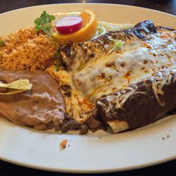 Enchiladas de Mole. Delicious! I got chicken, beef, & steak.