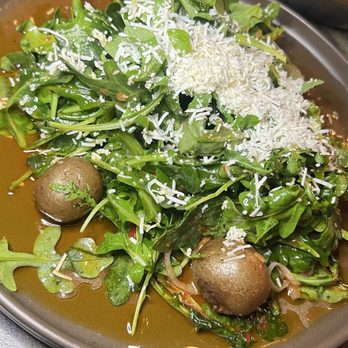 Filthy Animal - peewee potatoes, red kosho vinaigrette, arugula, and ricotta salatta that comes with the Flambadou 32oz Bone-in Ribeye - Cocktail Bars Near Me - Tempe, Arizona