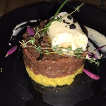 Mama Bistro - Cadiz Red Tuna Tartar, fresh Mango topped with ginger ice cream 12,50€ Was great. Quantity was also. - Mediterranean Near Me - Seville, SE