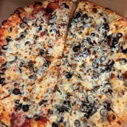 Stan's Late Night Pizza Factory - Half pesto olive oil half red sauce with olives and mushrooms