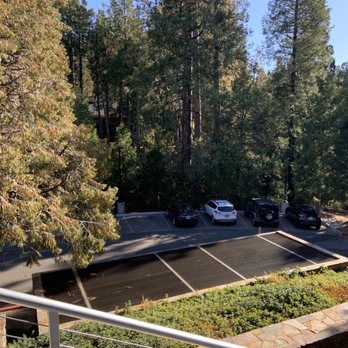 Idyllwild Brewpub - Our seats overlooking the parking lot and forest. - Brewpubs Near Me - Idyllwild, California