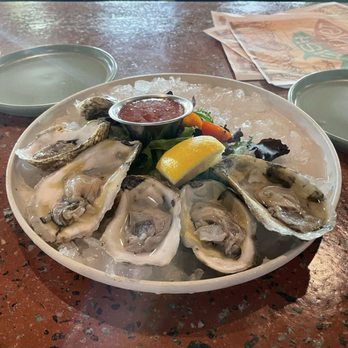 The Fish Market - 1/2 dozen Raw Oysters - Bars Near Me - Port St. Joe, Florida The Fish Market - 1/2 dozen Raw Oysters - Bars Near Me - Port St. Joe, Florida