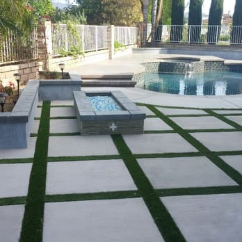 Diamond Builders - a backyard with artificial grass - General Contractors Near Me Diamond Builders - a backyard with artificial grass - General Contractors Near Me