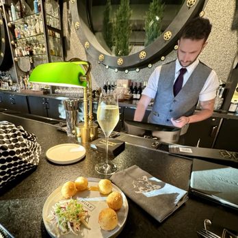 Wolf by Vanderpump at Caesars Republic Lake Tahoe - Goat Cheese Balls with a glass of Moet and Chandon Champagne - American Near Me - Stateline, Nevada
