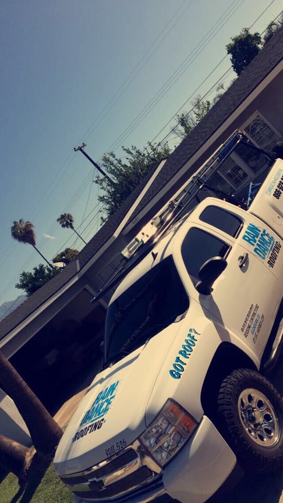 Slide of Rain Dance Roofing