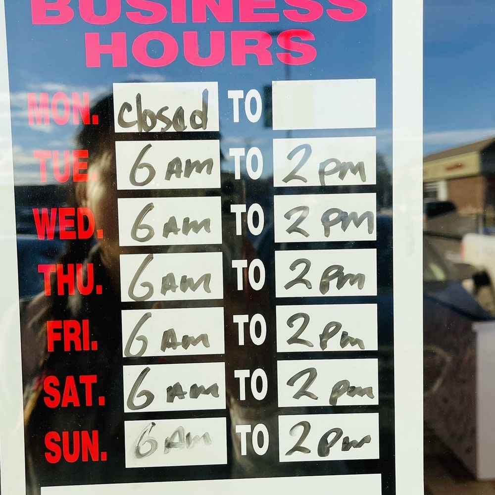 a business hours sign a business hours sign