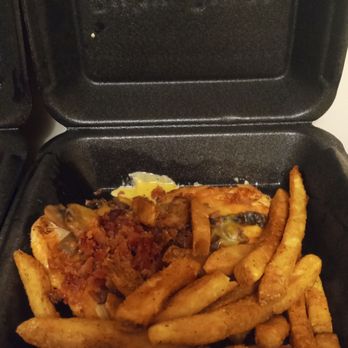 Ruby River - Second portion of smothered chicken dinner with second portion of seasoned battered fries. - American Near Me - Ogden, Utah