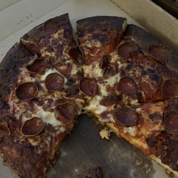Old Chicago Pizza + Taproom - Burnt pizza. Yuck! - Pizza Near Me - Columbia, South Carolina