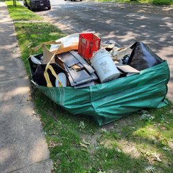 MPLS Junk Pros - Dumpster bags...even the ones that are over filled.
