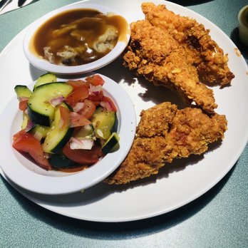 Baker's Kitchen - Chicken tenders, mashed potatoes and gravy, cucumber and tomato salad - Southern Near Me - New Bern, North Carolina Baker's Kitchen - Chicken tenders, mashed potatoes and gravy, cucumber and tomato salad - Southern Near Me - New Bern, North Carolina