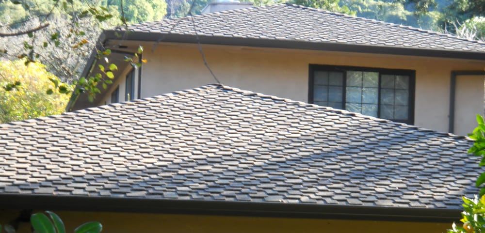 Slide of Signature Roofing