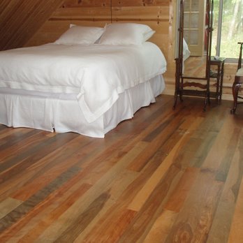 Classic Hardwood Floors - a bed and a chair - Flooring Near Me Classic Hardwood Floors - a bed and a chair - Flooring Near Me